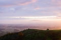 Looking down on the English countryside on a beautiful misty winters morning. Looking across Worcestershire to Bredon Hill from th Royalty Free Stock Photo