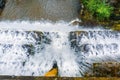 Looking down at the flow of water falling over a concrete dam, San Francisco bay area, California Royalty Free Stock Photo