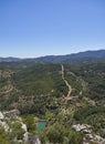 Looking down into the forested Valley and a small reservoir, at Sierra de las Nieves Parque Natural. Royalty Free Stock Photo