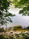 Calm water with sandy shoreline