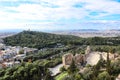 Looking down on the iconic ancient theater of Herodus Atticus near Acropolis hill, Athens historic center with rooftops of Athens Royalty Free Stock Photo