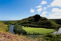 Looking down at the Maunakapu mountains and Wailua River in Kauai, Hawaii, USA, with a group of kayakers Royalty Free Stock Photo