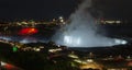 Looking down at Niagara Falls lit up in colors at night Royalty Free Stock Photo