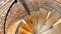 Birds eye view of a wooden spiral staircase Royalty Free Stock Photo