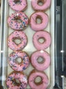 Looking down on pink donuts