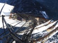 Looking down at sea from aloft in a tallship