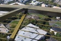 Looking down at the Seattle Center Armory, with large spiders painted on the roof from the Space Needle Royalty Free Stock Photo