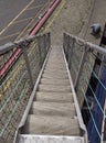 Looking down a Ships Gangway to the Quayside below from a Seismic Vessel in the Port of Amsterdam. Royalty Free Stock Photo