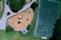 Small playground and basketball court.