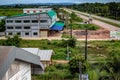 Looking down on some buildings and grass in Bueng Kan Thailand. Royalty Free Stock Photo