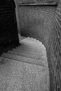 Looking down some winding street steps curving to the right