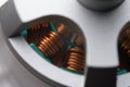 Looking down tall copper coils in a brushless electric drone motor