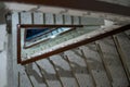 Geometric stairwell looking down creating triangle pattern Royalty Free Stock Photo
