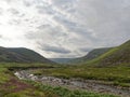 Looking down the Valley of Glen Lethnot with the Waters of Saugh gently meandering down the flat Valley Floor