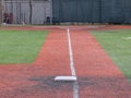 Looking down the foul line from third base to the batter box of a turf baseball field Royalty Free Stock Photo