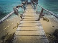 Looking down on wooden pier at beach Royalty Free Stock Photo