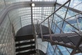 Looking downwards in an open stairwell of a modern building