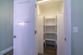 Looking into empty interior of a walk-in closet Royalty Free Stock Photo