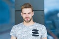 Looking forward only. macho man glass building backdrop. male fashion summer trend. strong-willed male. unshaven man Royalty Free Stock Photo