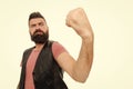 Looking frighteningly as a muscular man. Bearded muscular man shaking fist. Brutal hipster flexing his arm with muscular Royalty Free Stock Photo