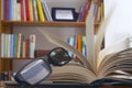 Looking glasses on an open book Royalty Free Stock Photo