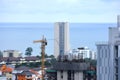 Looking from the height See a city in a tight city with tall buildings and beautiful skies.