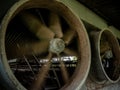 looking inside the livestock house through the space of the exhaust fan blade Royalty Free Stock Photo