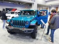 Looking at a Jeep at the Auto Show