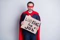 Looking for a job. Photo of stressed mature dismissed business guy super hero costume hold placard need work ask help