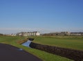 Looking at Links Parade Houses and Apartments from the Barry Burn and across the 18th Fairway of Carnoustie. Royalty Free Stock Photo