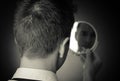 Looking in the mirror and reflecting Royalty Free Stock Photo