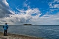 Looking out at island of Irelands Eye from Howth habour Dublin Ireland