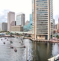 Looking Out Over the Baltimore Inner Harbor Where Tourists Ride in Pirate Themed Paddle Boats Royalty Free Stock Photo