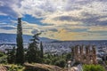 Looking out over the cityscape of Athens and over the Odeon of Herodes Atticus from the Acropolis near sunset Royalty Free Stock Photo