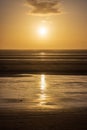 Looking out over Formby beach at low tide, with a sunset sky overhead Royalty Free Stock Photo