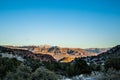 Looking out from the Pine Valley Mountains toward Zion National Park skyline in the distance