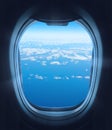 Looking out the plane windows. Beautiful view of a blue sky with fluffy clouds Royalty Free Stock Photo