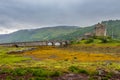 Looking out to Eilean Donan Castle on an overcast day in the Scottish highlands Royalty Free Stock Photo