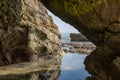 A View from inside a Cave on the Beach Royalty Free Stock Photo