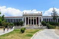 Looking outside at the front of the world famous National Archaeological Museum in Athens, Greece.  Several visitors are walking t Royalty Free Stock Photo