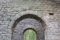 Looking outside from the inside of a ruin in the forest Royalty Free Stock Photo