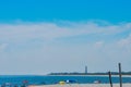 Looking Over the Sea on a Jersey Beach at a Lighthouse Royalty Free Stock Photo