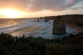 Looking over a green shrub at the sunset at Twelve Apostles on the Great Ocean Road in Australia Royalty Free Stock Photo