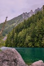 Looking over Lindeman Lake, BC to steep forested mountains Royalty Free Stock Photo