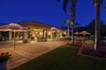 Looking over patio to outdoor seating area of luxury home Royalty Free Stock Photo