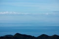 Looking over ridges in the distance at the Stewart Island / Rakiura from the Humpridge Walk in the South Island in New Zealand