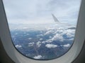 Looking Sky through the Window of an Airplane Royalty Free Stock Photo