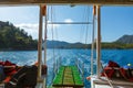 Looking to Rocky coast with trees in the Aegean Sea from yacht. Royalty Free Stock Photo