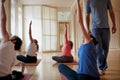 Are looking to take your practice in new directions. Shot of a group of people attending a yoga class. Royalty Free Stock Photo