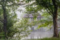 Gazebo on Lake in the Mist through the Trees at Meadowlark Regional Park VA